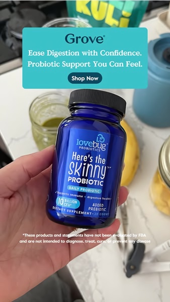 A handheld product shot of a probiotic supplement bottle set against a natural home kitchen background, using a clear benefit-driven headline overlay.